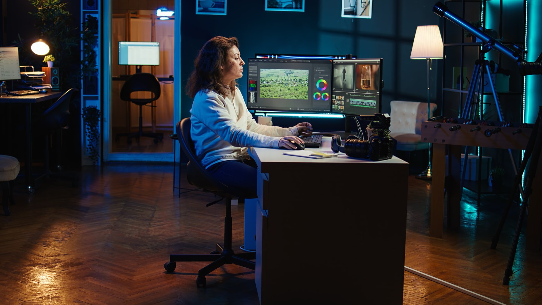 Video editor working at a studio workstation